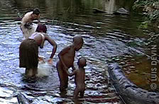 Luis Devin studying the water drums of the Baka Pygmies