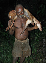 Pygmy with antelope (Baka Pygmies, Cameroon)